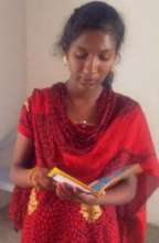 Jasmine with the book she chose