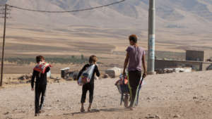 A family with the supplies they have received