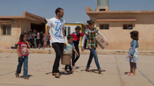 A family with the supplies they have received