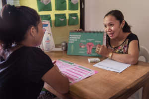 Midwife May, providing contraceptive counseling