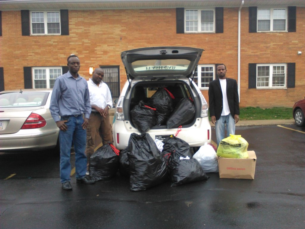 Winter clothes, guides to US for Darfur refugees