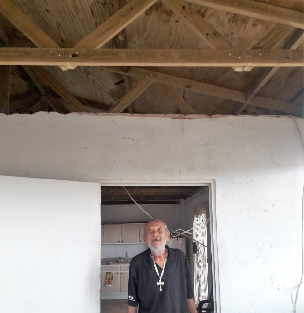 Eliseo Admiring His New Roof