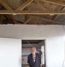 Eliseo Admiring His New Roof