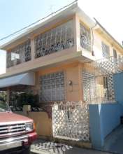 Jose's Newly Roofed Home, Exterior Side View