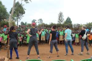 Visitors teaching kids song