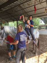 Ismael riding with Veronica