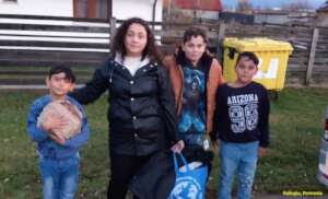 Children and teens given winter clothes at Refugiu