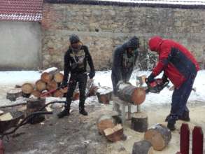 Firewood to heat a classroom in Romania