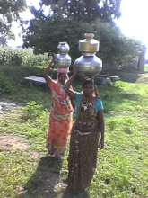 Women headcarrying Water in Rajasthan