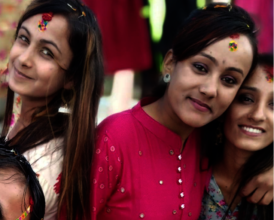 Bina, middle, celebrating Tihar (Diwali) this week