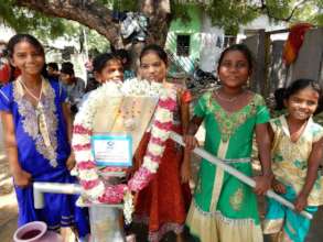 Girls Smiling at New BWF Village Water Well