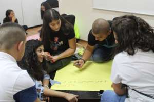 Kayan staff member facilitates workshop with youth