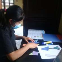 Hadasa doing her homework at Cojolya