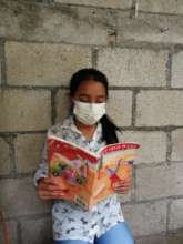 Dulce reading her favorite book