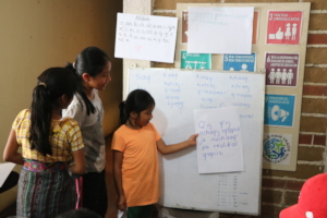 Dolores, Hadasa and Lidia reading tongue twisters