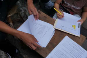 Israel and Damaris working on their assignments