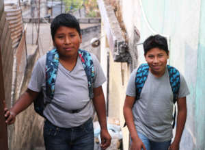 Diego, 13, and David, 14, head off to school!