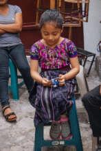 Miriam with her education card