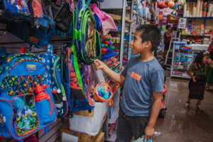 Elias - selecting his new backpack for school!!!
