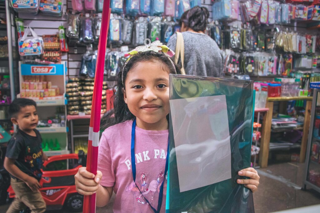 A student buying supplies for homework