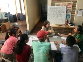 Students learn by playing games and laughing