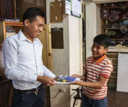 Jose our Program Director gives Manuel supplies