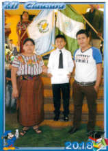Pedro and his parents at middle school graduation