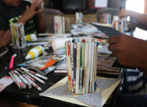 Students reused paper and cardboard for their pens