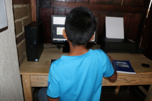 Pedro practices typing on our computers every day