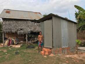 Improved latrine building