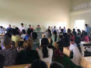 Meeting with recipients of bicycles