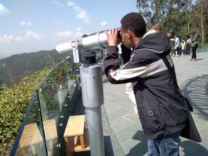 Children and youth checking out sites in the park