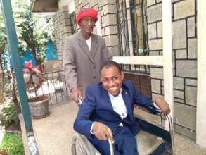 Lemma and his dad on his graduation day