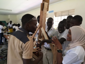 A student explains how their gravity light works