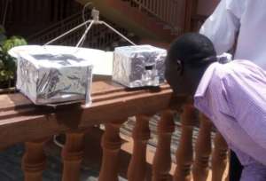 Teacher checking his heat resistant enclosure