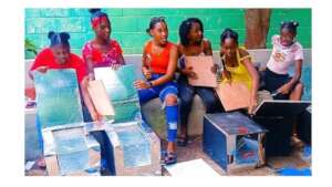 Haitian Girls Building Solar Cookers