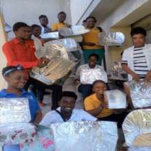 Group with their homework solar cookers