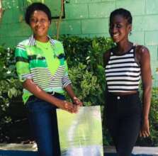 Aline congratulates 1 of 28 participants