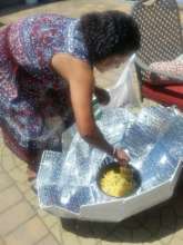 Rose cooking on solar oven