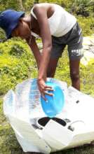 Cook with blue hat prepares a dish