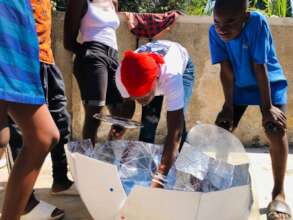 Teaching solar cooking at ACFFC