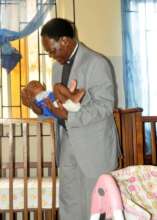 The Ven Dr. Sydney with baby Chinasa