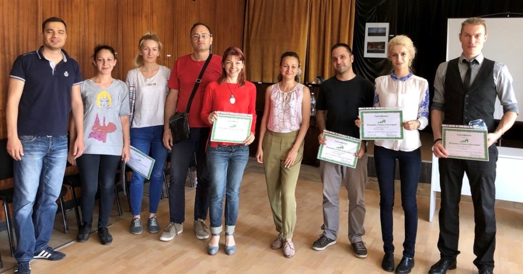 Asya and the volunteers of one workshop