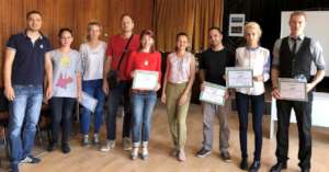 Asya and the volunteers of one workshop