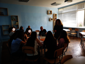 Volunteers discuss career paths with students