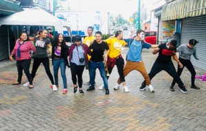 Students dancing for the public