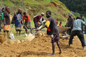 Community members maintain the airstrip vital link