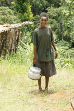 A Suowi Ankave girl gathering water for cooking