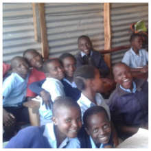 6th graders pause during Kiswahili class