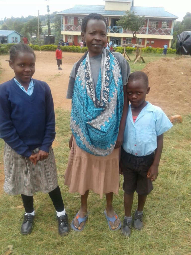 Elizabeth (center) with Cecilia and Emmanuel
